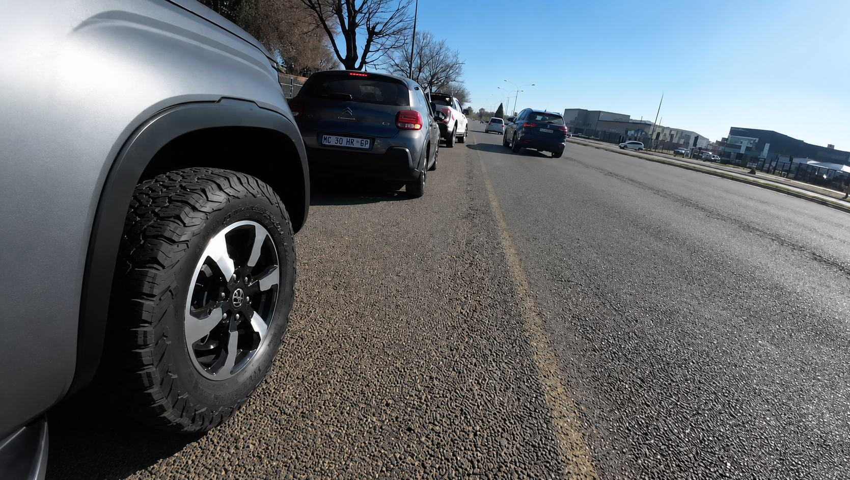 NoJack Anti-Hijacking Unit vehicle stopped alongside the intercepted grey Citroën C3 at the roadside in Benoni